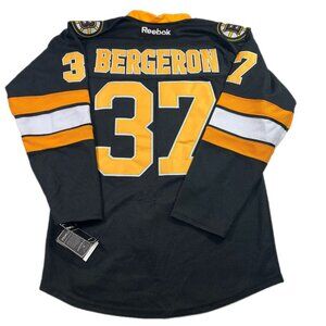 PATRICE BERGERON BOSTON BRUINS CENTER ICE REEBOK JERSEY SZ 50 Fighter Strap NWT